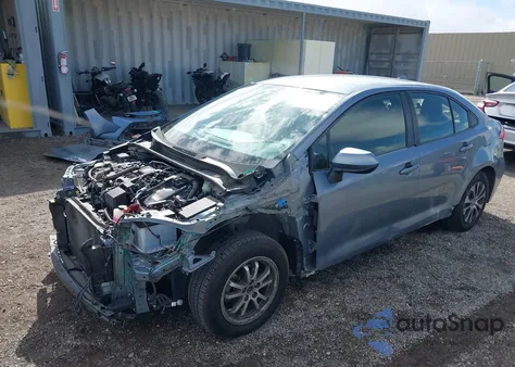 2022 Toyota Corolla Hybrid Le z USA, uszkodzony, nr VIN JTDEAMDE7NJ046474